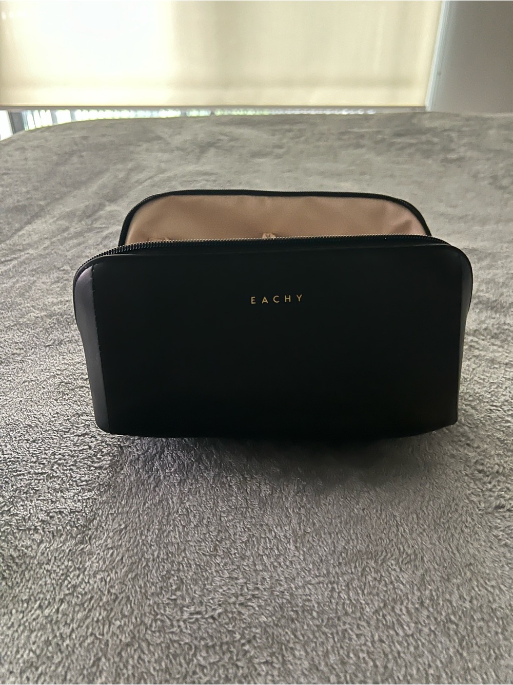 Black Toiletry Bag with Beige Interior